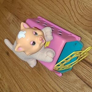 Vintage plush cat toy and carrier